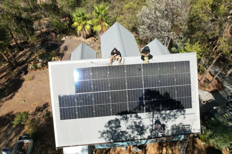 Aerial drone photo of solar panel installation on residential roof