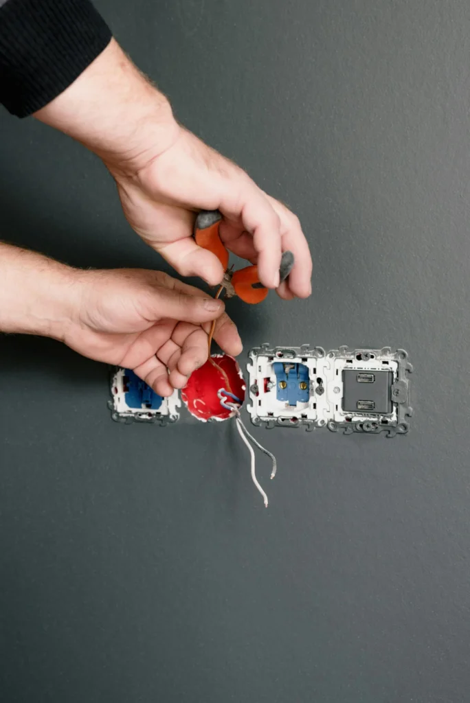 Electrician or technician performing residential electrical service